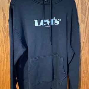 Three medium sized Levi’s sweaters